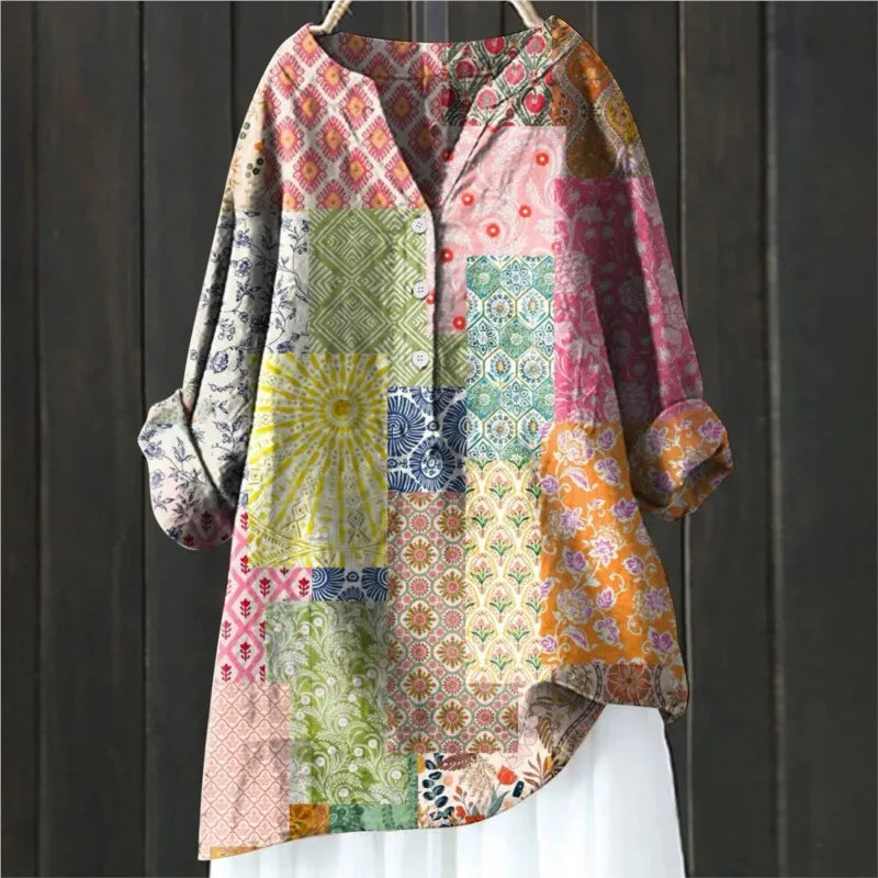 Women's long-sleeve floral blouse with delicate print, elegant and comfortable for daily wear.