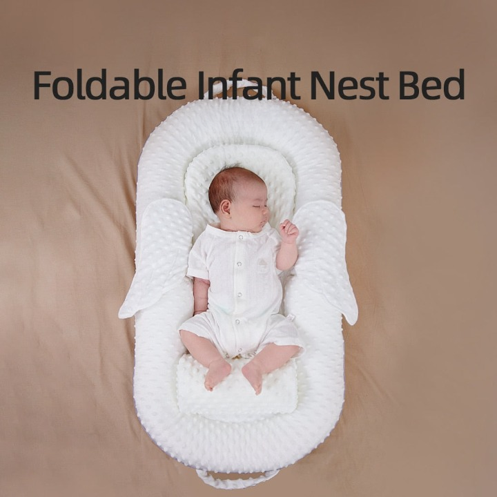 Close-up of breathable mesh & ergonomic back support in a baby sleep nest for newborn comfort.
