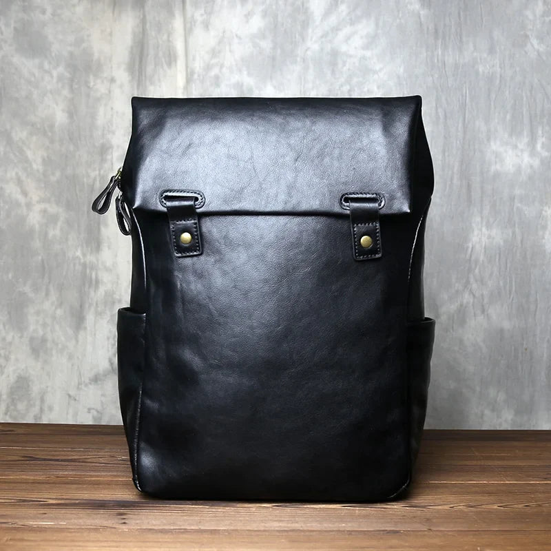 Durable men's vegetable-tanned leather backpack, excellent for business travelers and daily commuters.