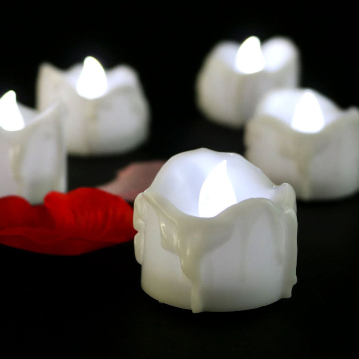 Battery-operated LED flameless candles with realistic flickering. Safe & decorative ambiance lighting for home.