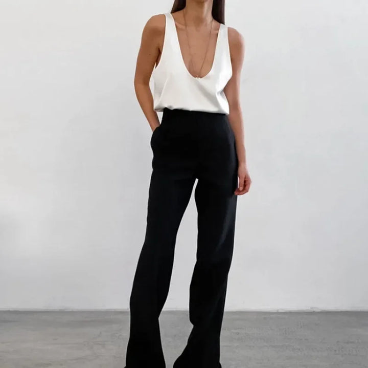 Elegant casual women's sleeveless scoop neck tank top, perfect for chic summer and spring outfits.
