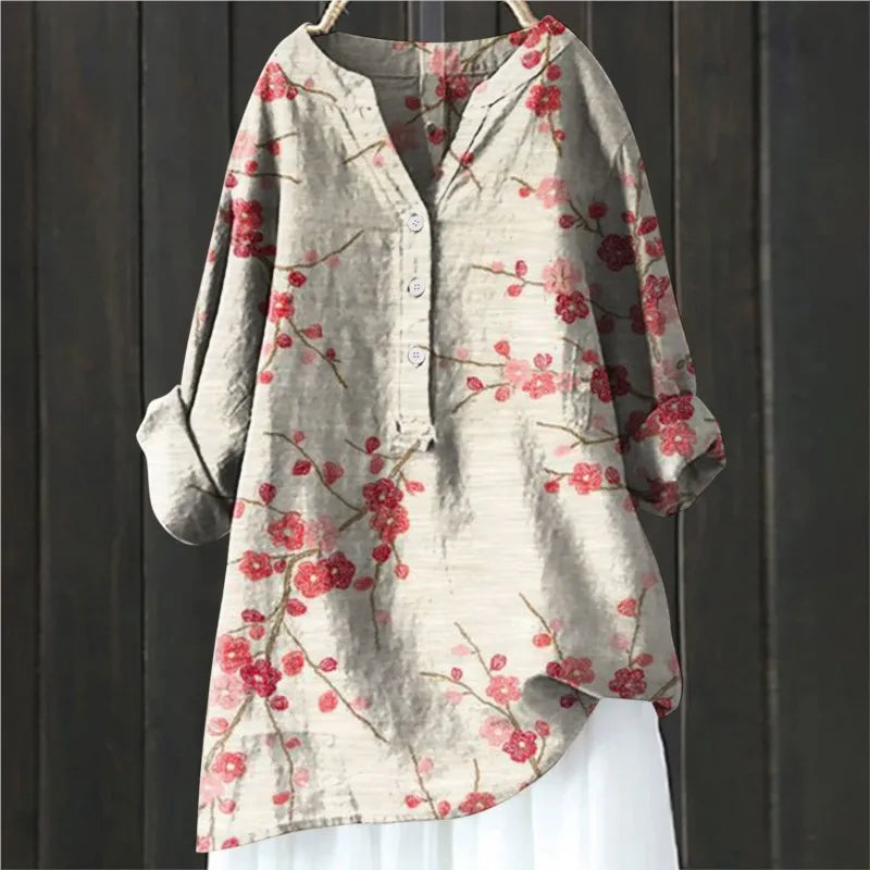 Women's elegant floral long-sleeve blouse for spring/summer casual wear.