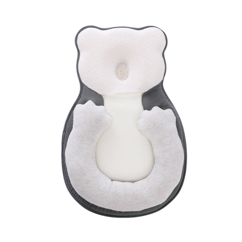 Portable newborn baby travel pillow with adjustable leg support, ideal for infant positioning & comfort.