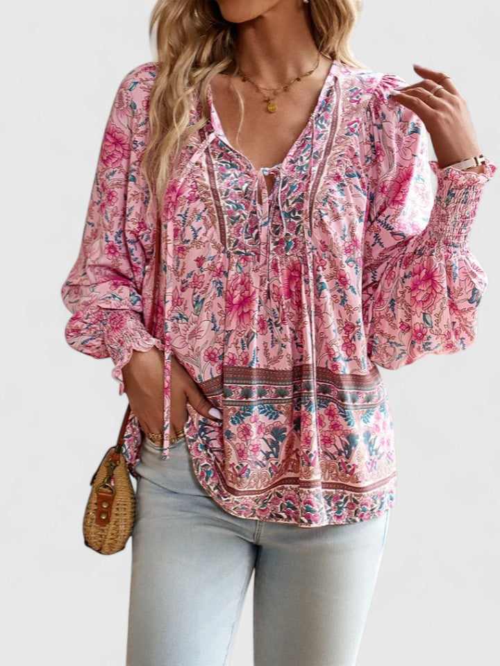 Women's V-neck lace-up bohemian blouse with unique paisley print & smocked sleeves. Chic long sleeve top.