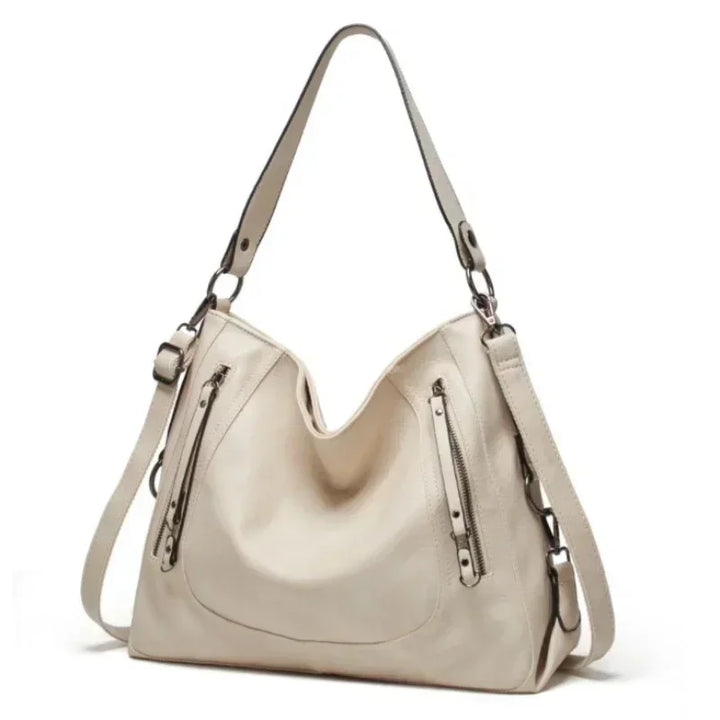 Stylish women's leather shoulder bag with vintage appeal. Spacious, durable, and a perfect everyday accessory.