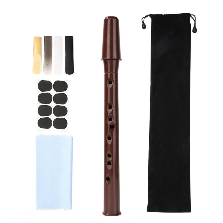 Pocket sax: portable mini saxophone with alto mouthpiece, perfect for on-the-go musicians.
