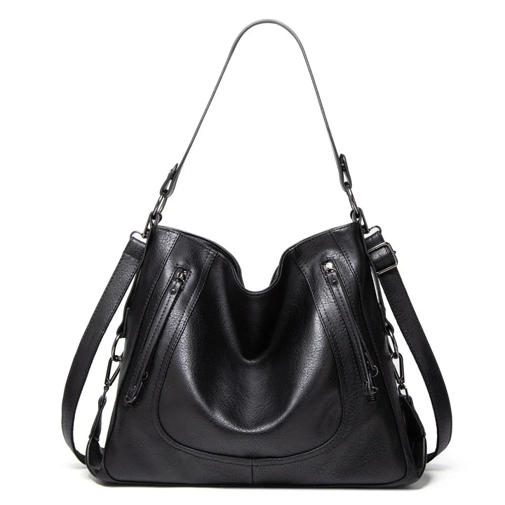 Classic women's leather handbag for versatile everyday use. Spacious and durable, a timeless fashion accessory.