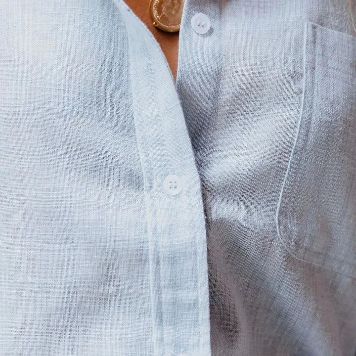 Stylish women's long sleeve button-up blouse. Classic design, modern fit, perfect for elegant timeless fashion.
