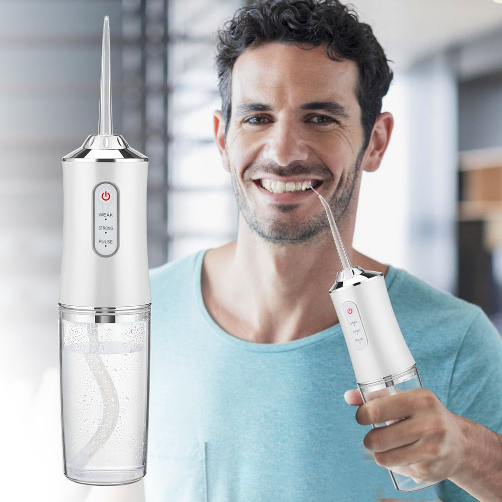 Powerful electric oral irrigator for deep cleaning, plaque removal & gum health.