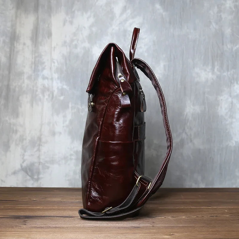 Vegetable-tanned cowhide business backpack for men, ideal for laptops, travel, and daily professional use.