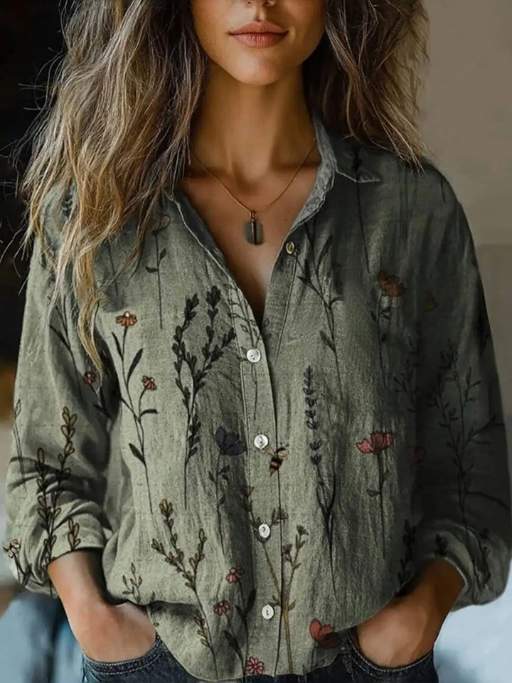 Women's bohemian paisley pattern long sleeve button-up blouse, with a relaxed and stylish fit.