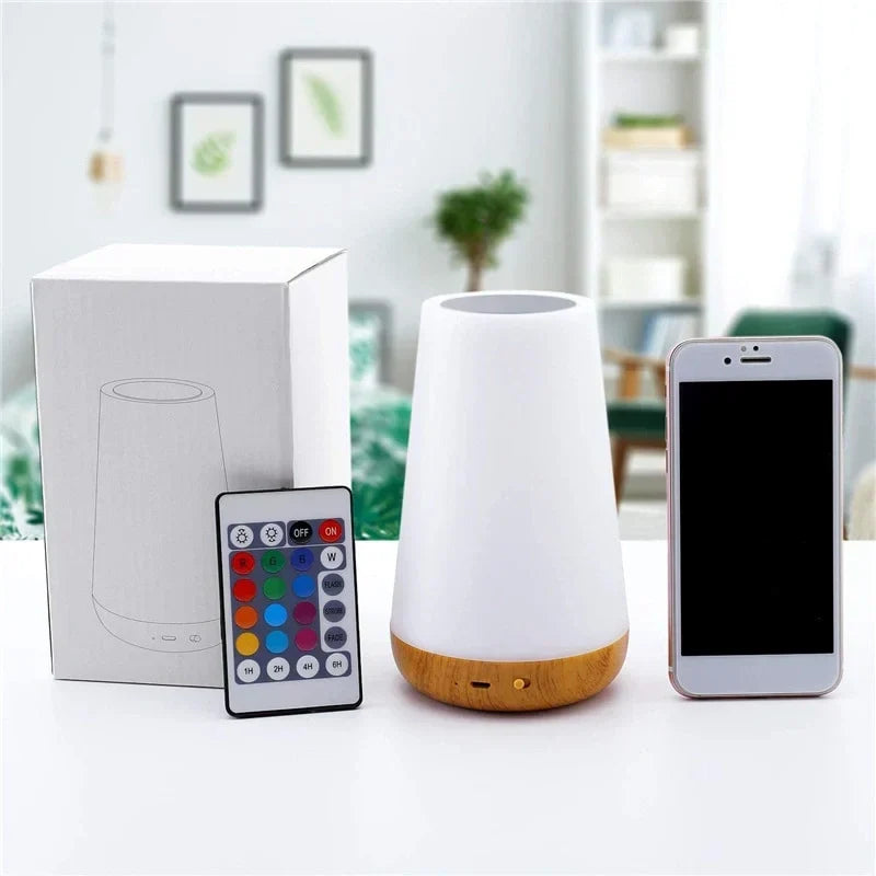 Soft glow of a multicolor LED night light, dimmable for gentle ambient illumination in any room.