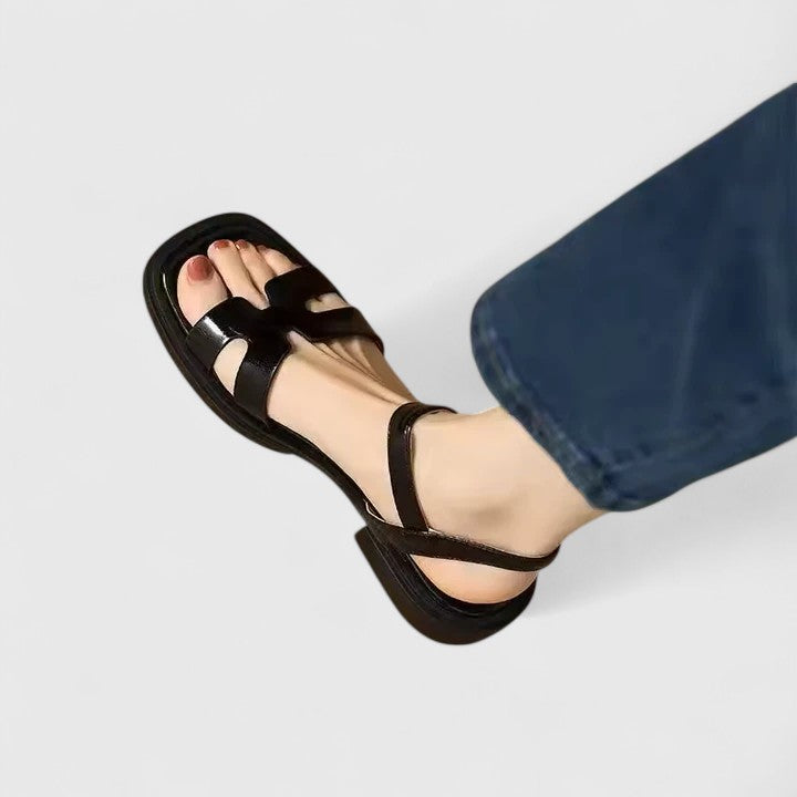 Elegant women's flat sandals with low block heel & ankle strap. Perfect for chic summer everyday wear.