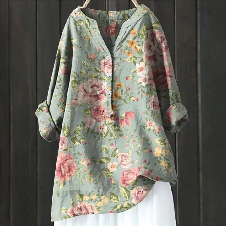 Elegant women's floral blouse, long sleeve, chic, versatile for summer/spring fashion.