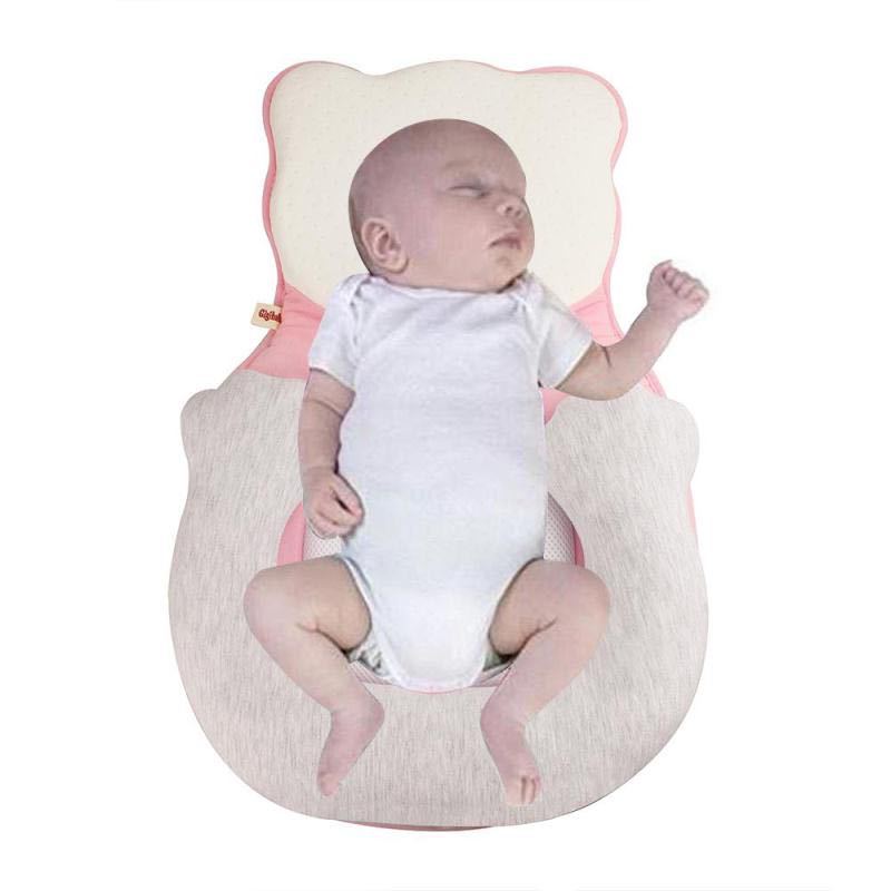 Nursery essential: All-year newborn baby positioning pillow with adjustable leg support for infant comfort.