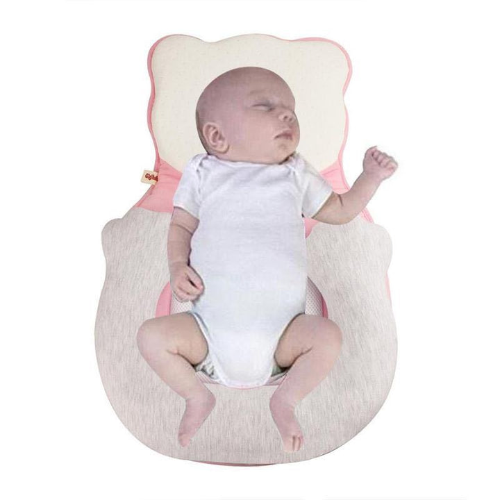 Nursery essential: All-year newborn baby positioning pillow with adjustable leg support for infant comfort.