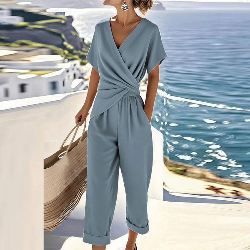 Stylish women's matching V-neck top and wide leg pants set. Comfortable & versatile for spring or fall fashion.