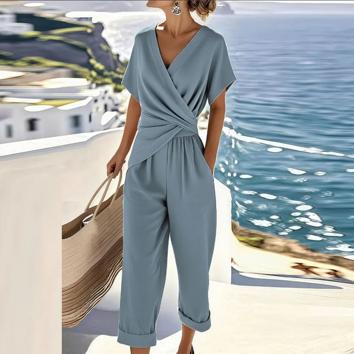 Stylish women's matching V-neck top and wide leg pants set. Comfortable & versatile for spring or fall fashion.