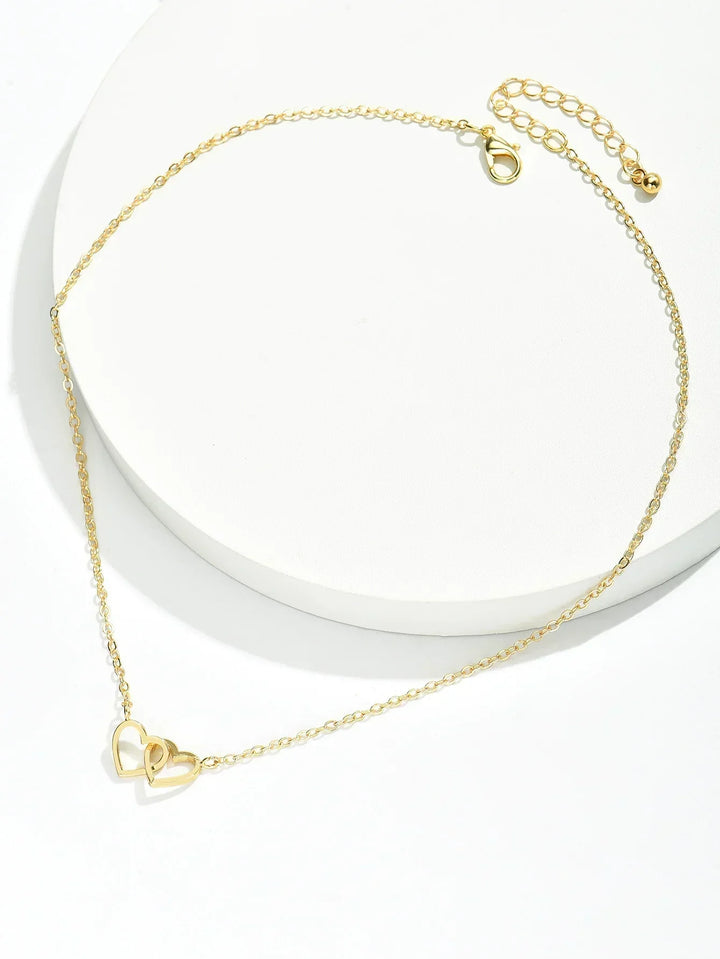 Timeless women's gold vermeil interlocking heart necklace, an elegant sterling silver gift for her.