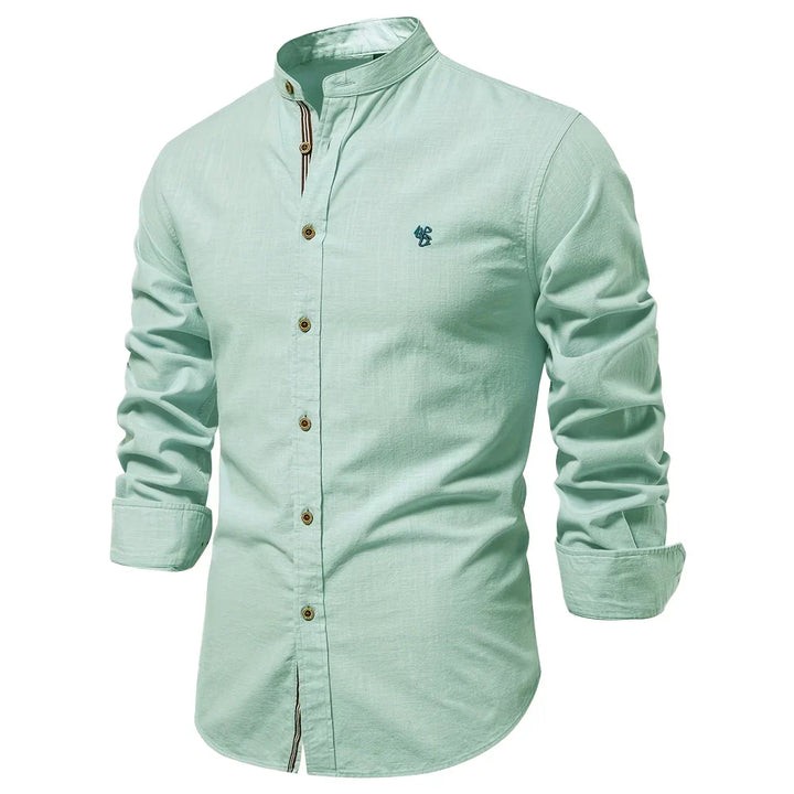 Elegant men's button-down shirt. Slim fit, long sleeve, ideal for workwear or smart casual men's fashion styles.