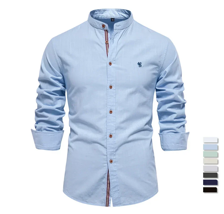 Close-up of a men's slim fit button-down shirt. Long sleeve, versatile for work or casual events. Men's clothing.