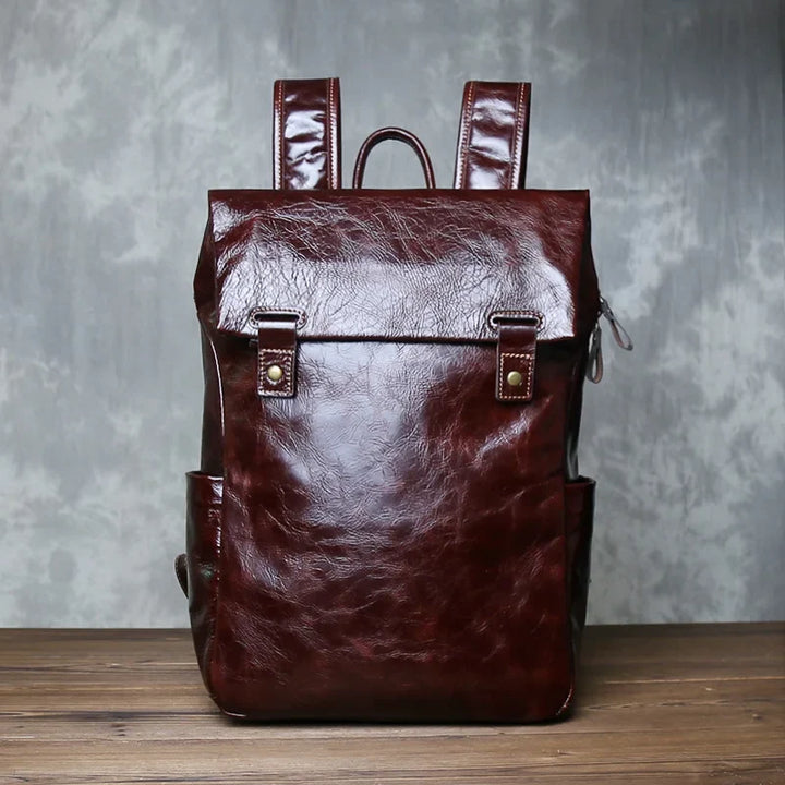 Men's professional leather work bag with laptop compartment, offering large capacity and smart organization.