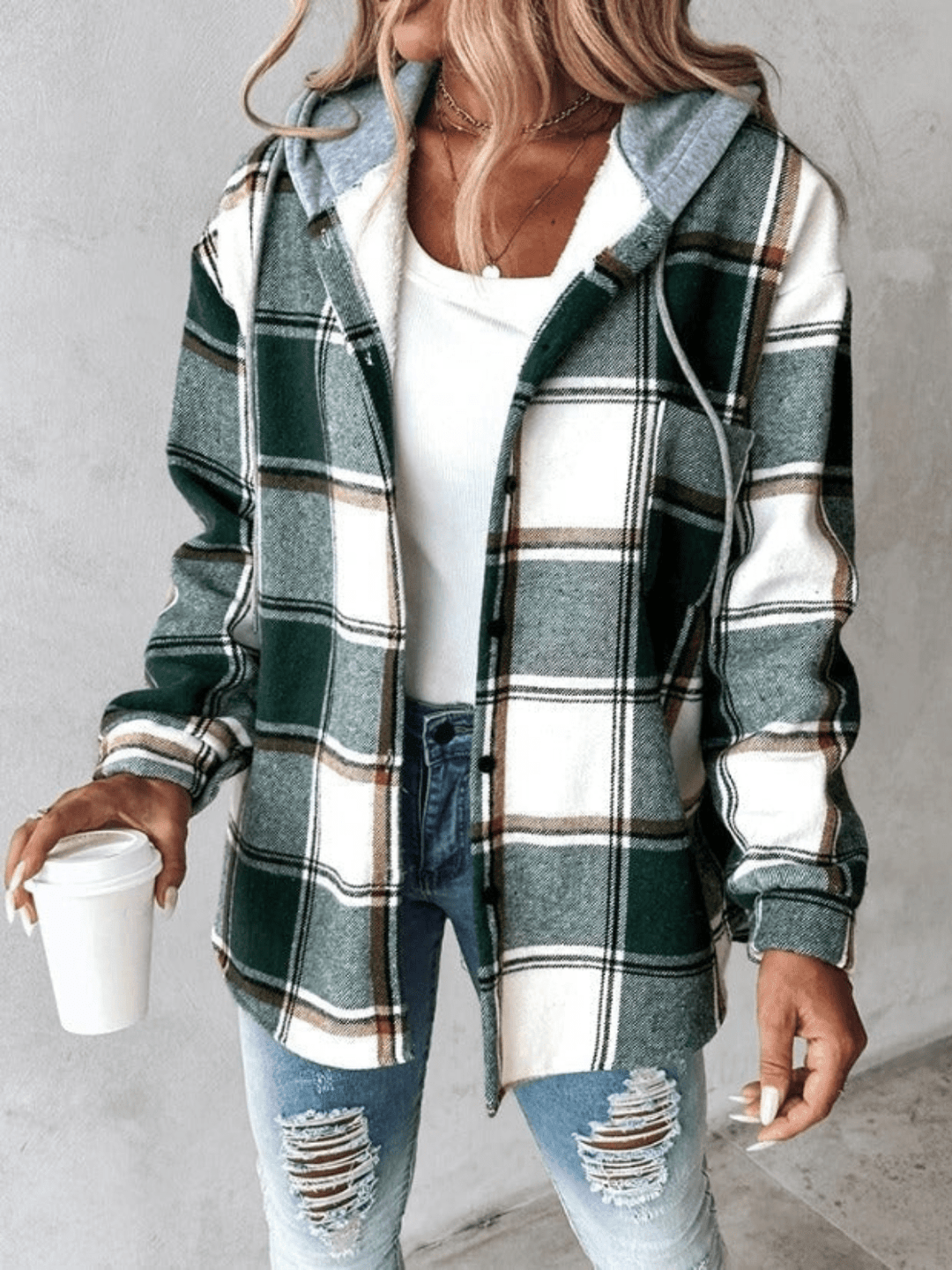 Relaxed fit women's checkered hoodie jacket, a hooded top perfect as a cozy layering piece for winter.