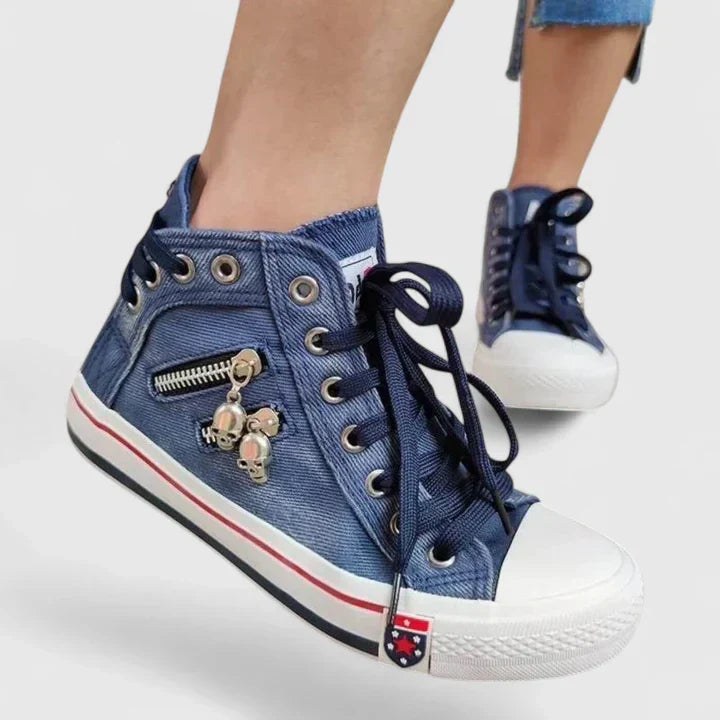 Women's high-top denim sneakers with stylish zip and stud details, perfect for casual streetwear fashion.