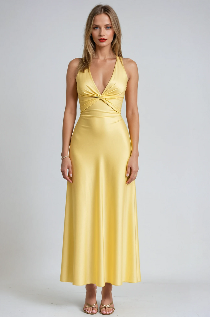 Elegant women's yellow halter neck prom maxi dress, perfect for formal evening events.