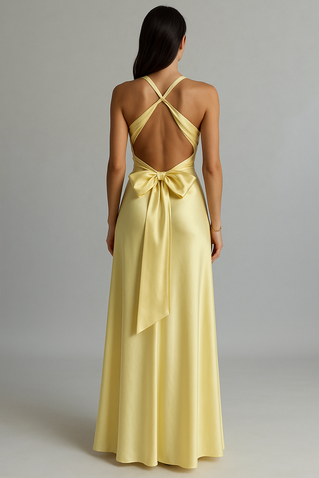 Stunning pink women's halter neck maxi dress, flowing & elegant, ideal for special occasions.