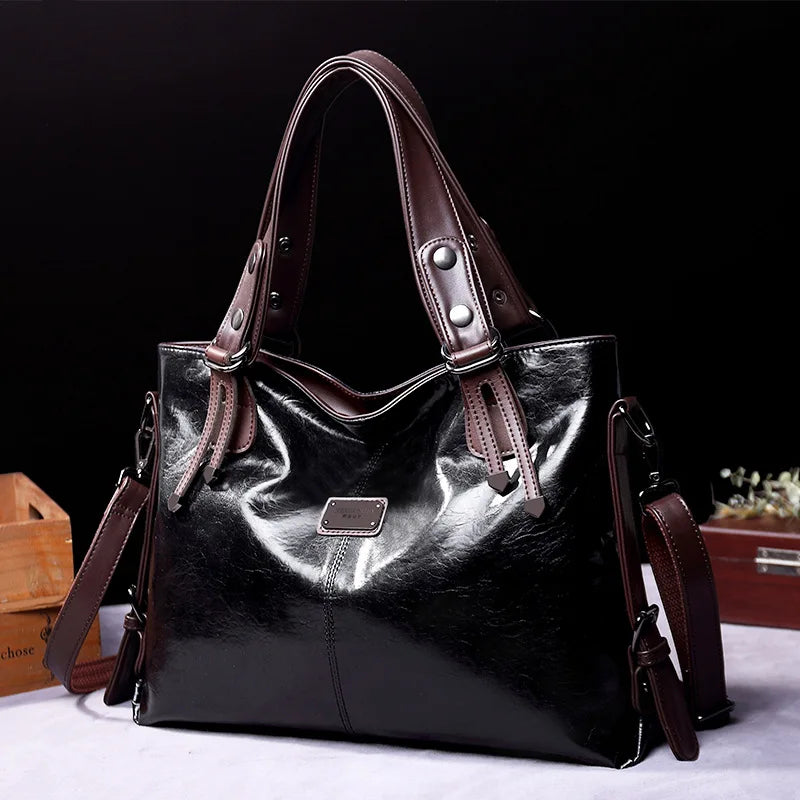 Back view of a genuine leather women's shoulder bag, highlighting its elegant design and durable construction. Versatile everyday bag.