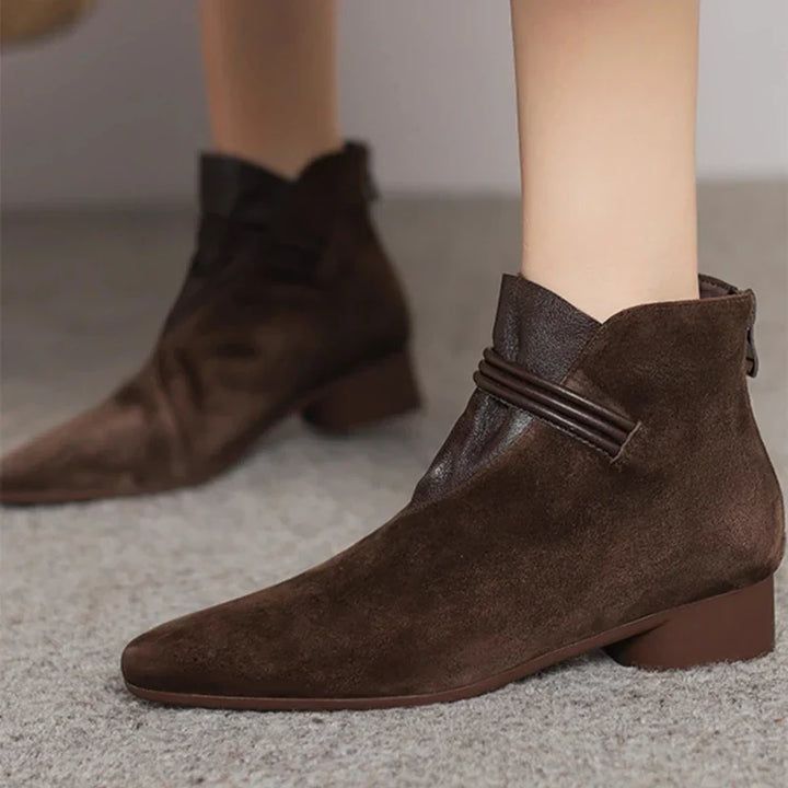 Black comfortable women's low heel ankle boots, perfect for everyday style and fall fashion.