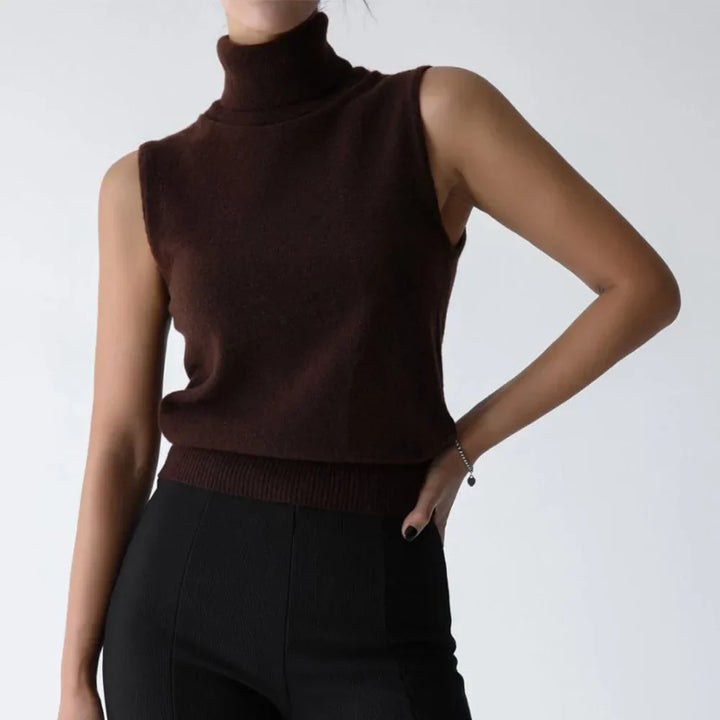 Sleek women's sleeveless top with a flattering turtleneck, ideal for layering.