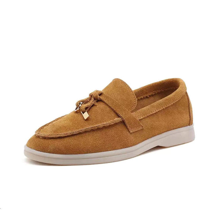 Sophisticated pointed-toe slip-on loafers for women, offering comfortable and elegant everyday footwear.