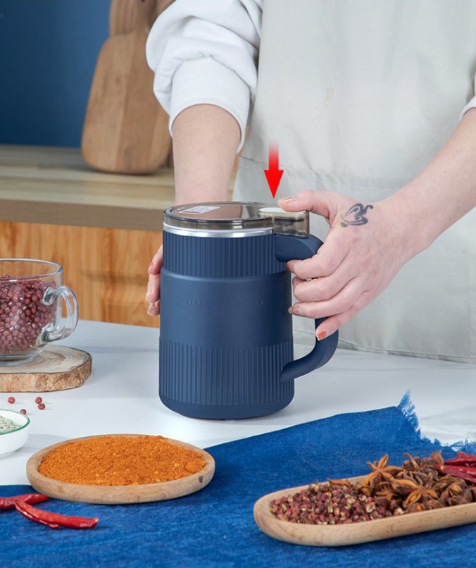 Modern electric grain and spice mill for countertop use. Enjoy fresh flour for all your baking needs.