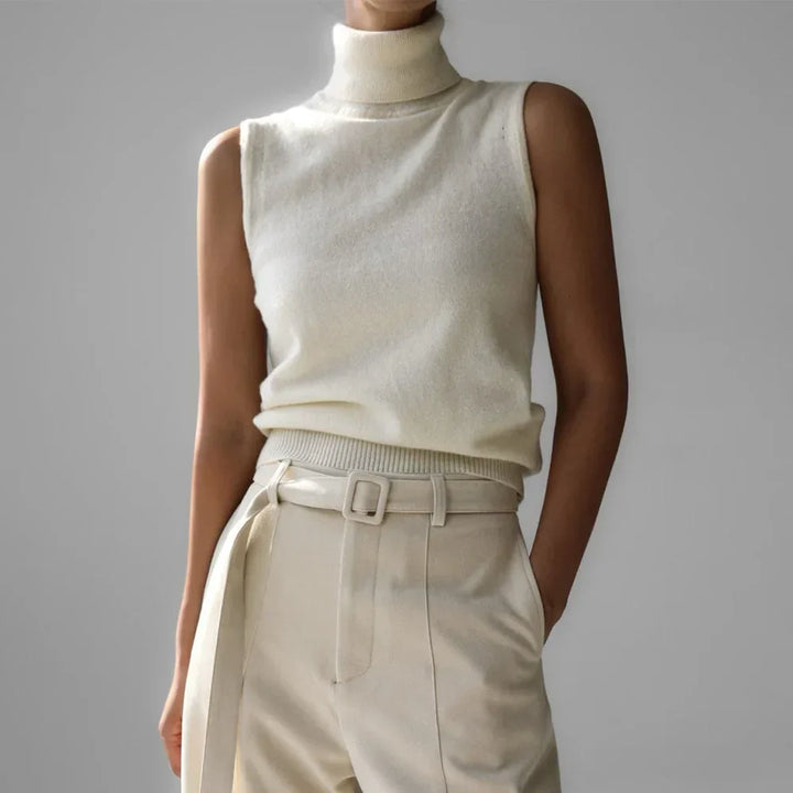 Women's chic sleeveless turtleneck blouse, a comfortable and stylish wardrobe staple.