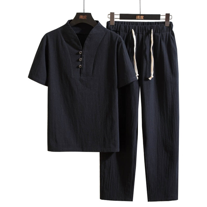 Man modeling a stylish breathable summer shirt & shorts set, perfect for beach style & resort fashion.