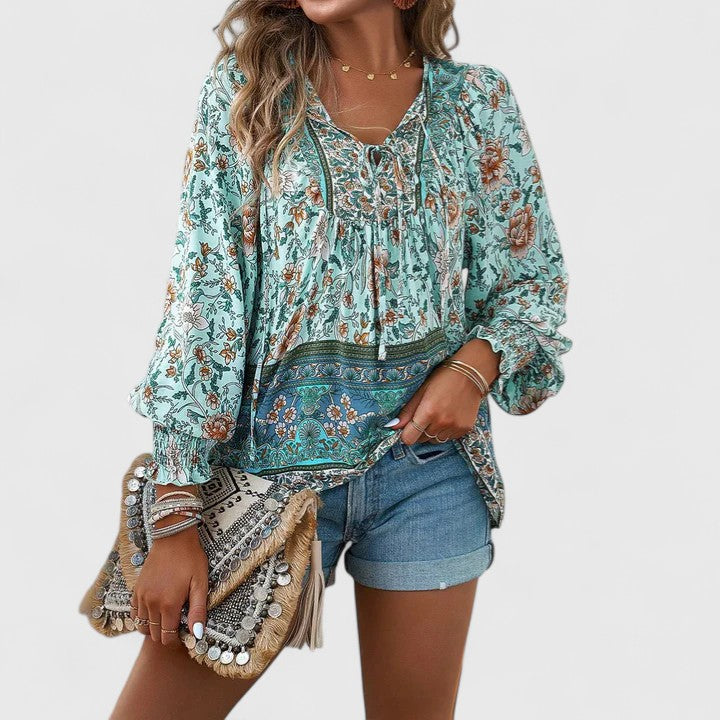 Chic women's long sleeve print boho blouse, V-neck lace-up top. Great for spring outings or summer festivals.