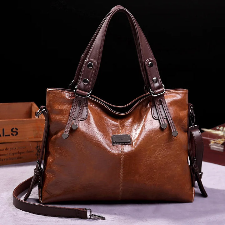 Stylish genuine leather shoulder bag for women, perfect for everyday use. Durable and elegant women's cross-body bag.