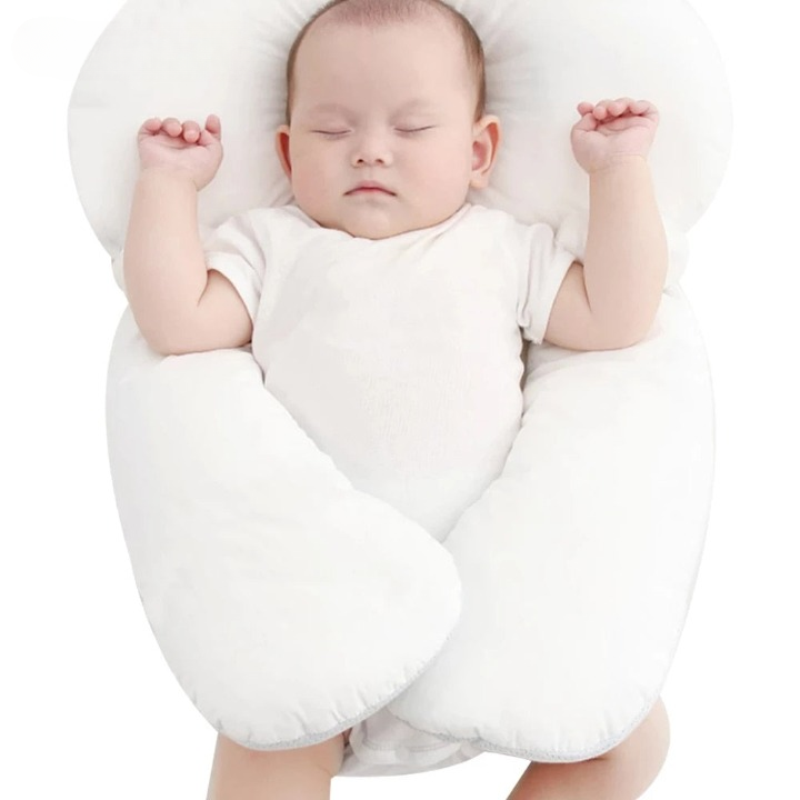 Breathable cotton baby pillow providing essential newborn support for comfortable & safe infant sleep.