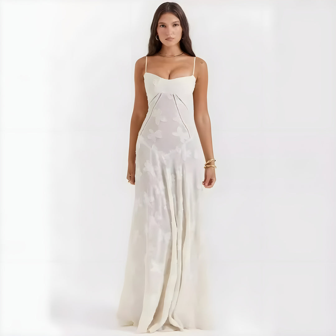 Women's A-line maxi dress with sweetheart neckline, floral pattern, ideal for wedding guest.