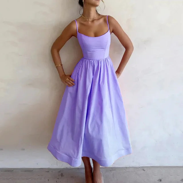 Stylish women's purple scoop neck maxi strap dress. Sleeveless A-line party wear, elegant for any summer event.