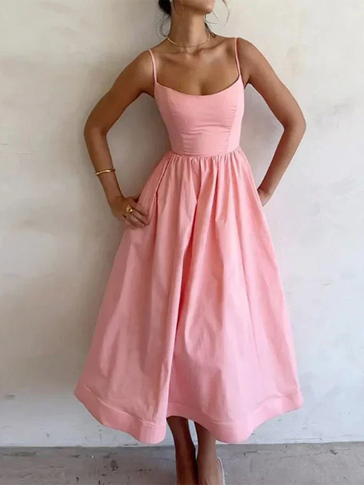 Elegant women's pink maxi strap dress with scoop neck, perfect for summer parties. A-line sleeveless design.