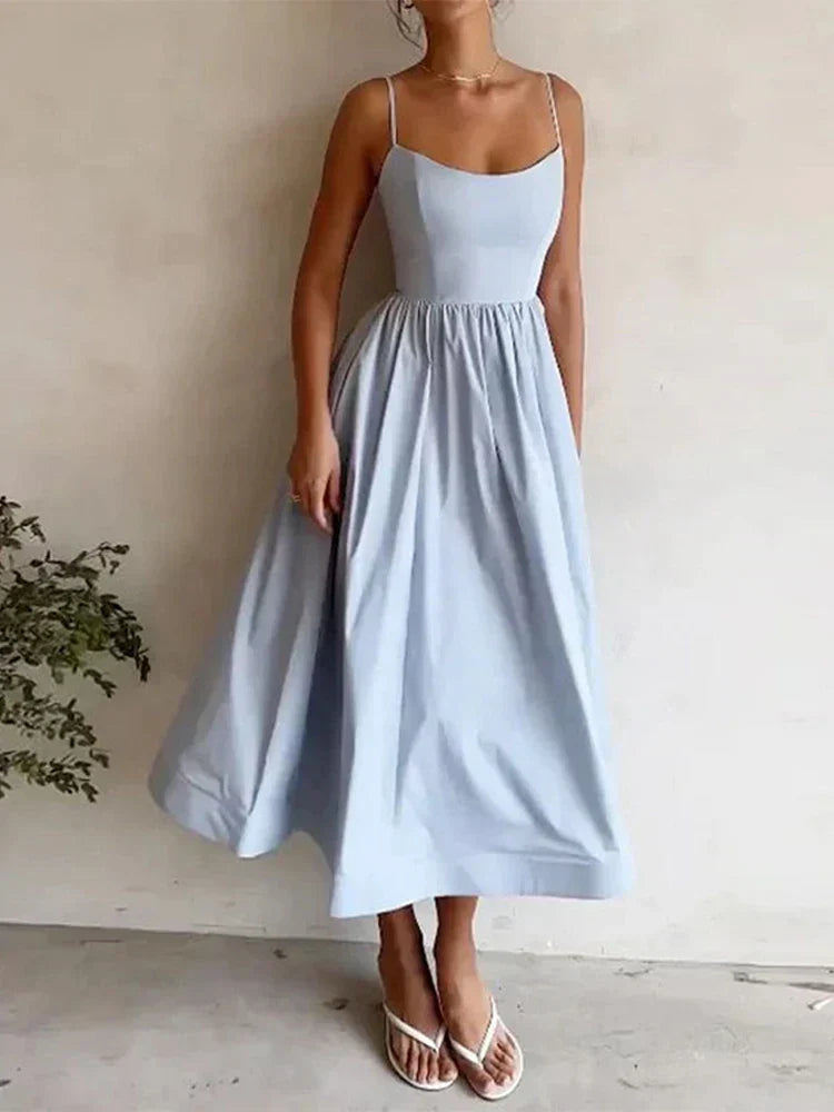 Comfortable women's pink A-line maxi strap dress. Scoop neck sleeveless design, an elegant choice for summer parties.