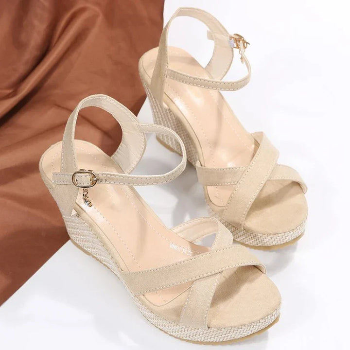 Chic women's platform heels with an adjustable ankle strap, elegant design, ideal for special occasions.