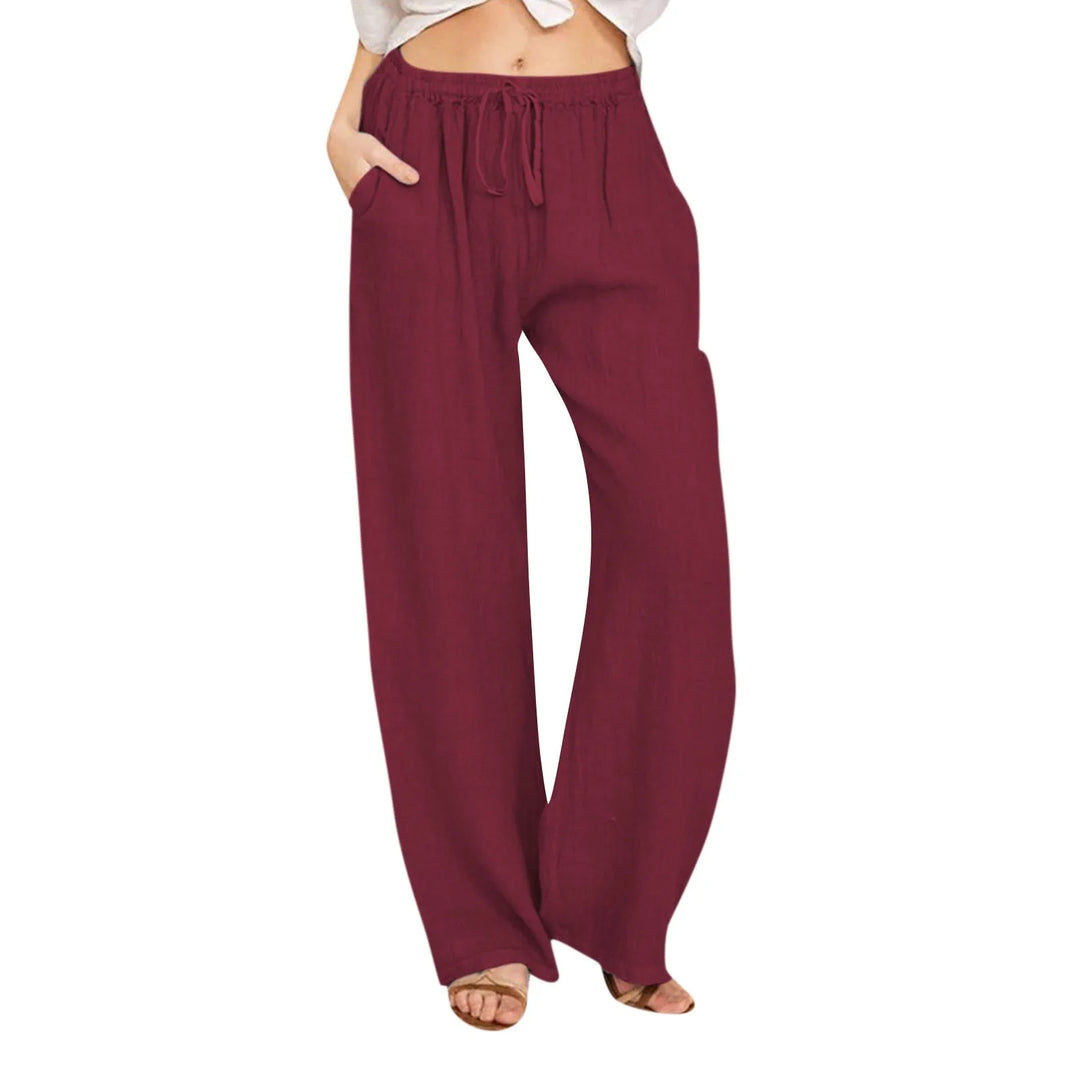 Chic women's wide leg pants, high waisted with a practical drawstring, great for a relaxed fit.