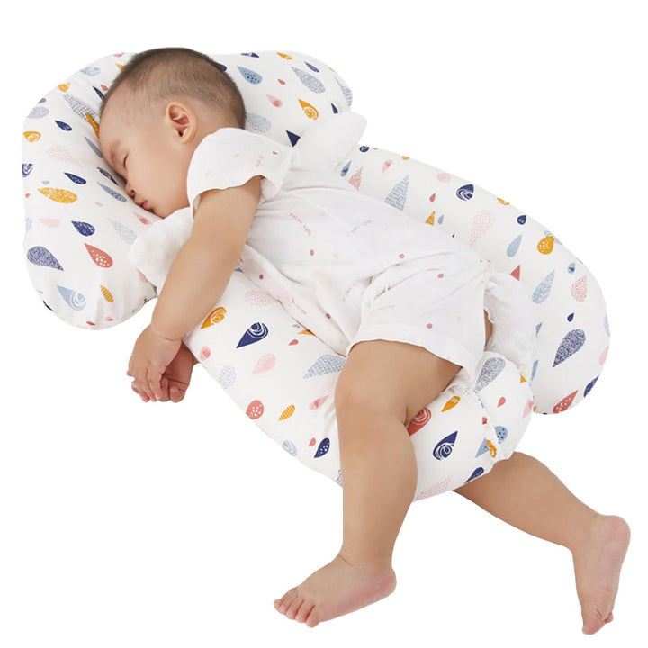 Ergonomic infant pillow ensures safe, comfortable sleep & helps prevent flat head syndrome. Gentle baby support.