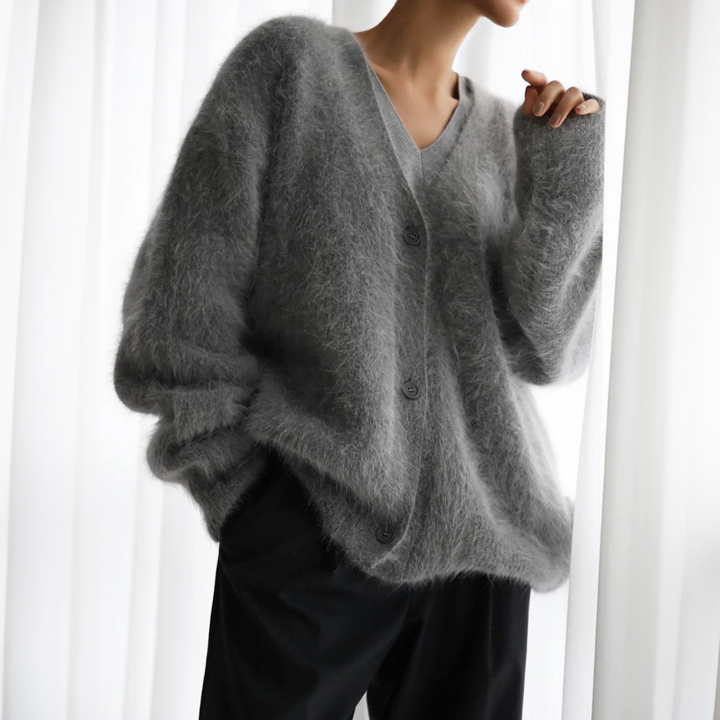 Comfortable women's open front cardigan, a stylish layering piece for daily wear.