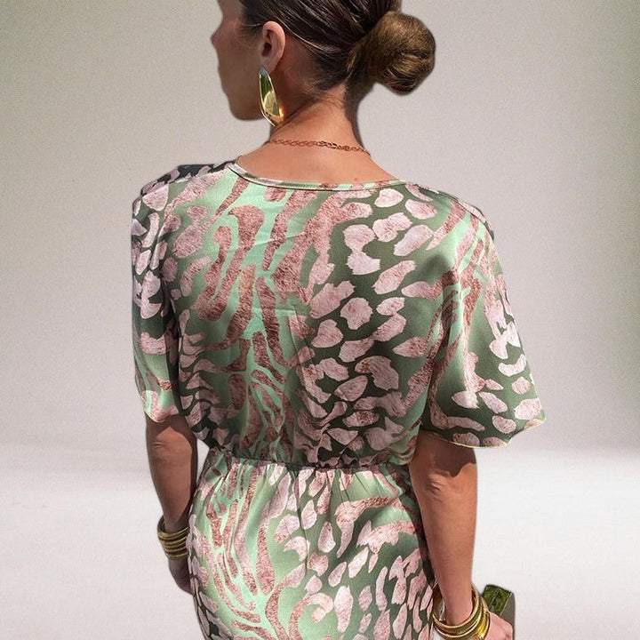 Chic women's V-neck wrap maxi dress. Elegant occasion wear, ideal for wedding guests, formal events & evening parties.