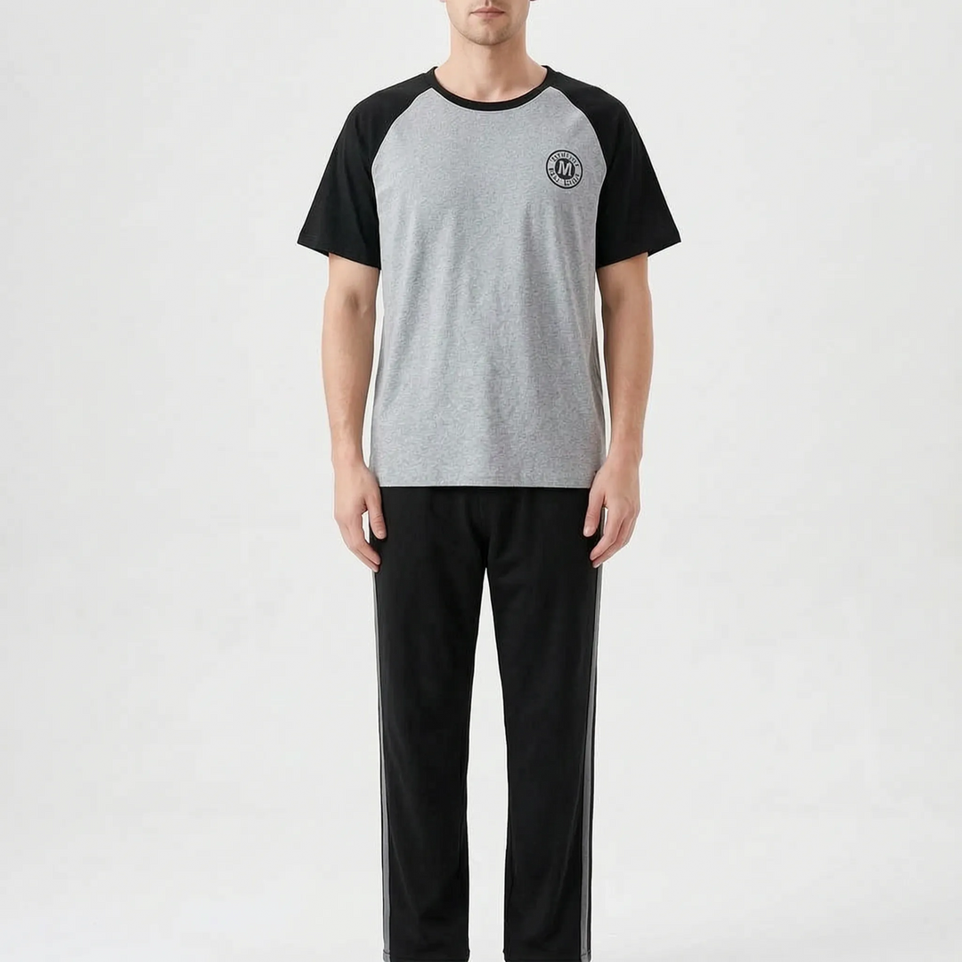 Two-piece men's short sleeve pajama suit, relaxed fit for summer comfort.